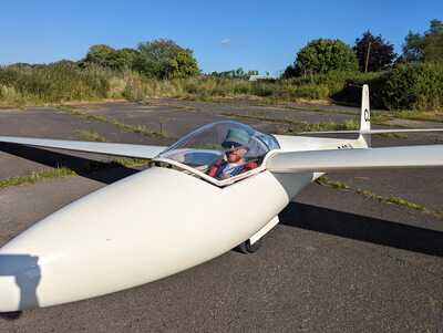 Unexpected Vistor Arrived in a Libelle (sailplane). The tug plane (PA25) landed shortly after his arrival to get him home. 